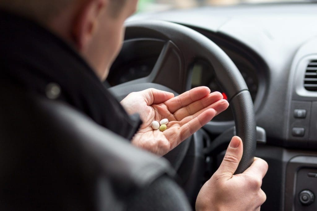 Man takes pills before driving