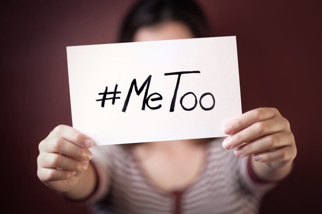 #metoo and sexual assault A woman holds a #metoo sign